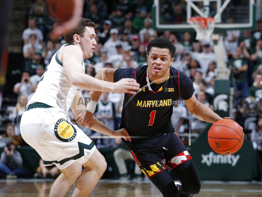 Al Goldis Maryland's Anthony Cowan, right, drives against Michigan State's Foster Loyer during the first half of an NCAA college basketball game, Monday, Jan. 21, 2019, in East Lansing, Mich. (AP Photo/Al Goldis)