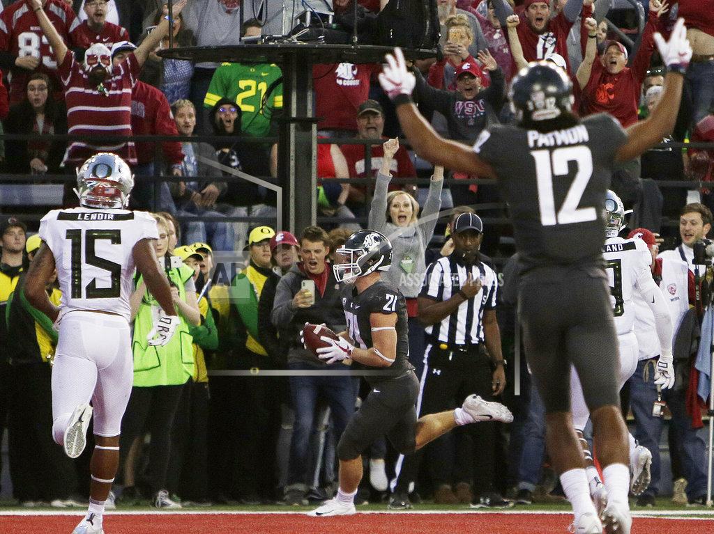 Young Kwak Washington State running back Max Borghi (21) runs for a touchdown during the first half of an NCAA college football game against Oregon in Pullman, Wash., Saturday, Oct. 20, 2018. (AP Photo/Young Kwak)