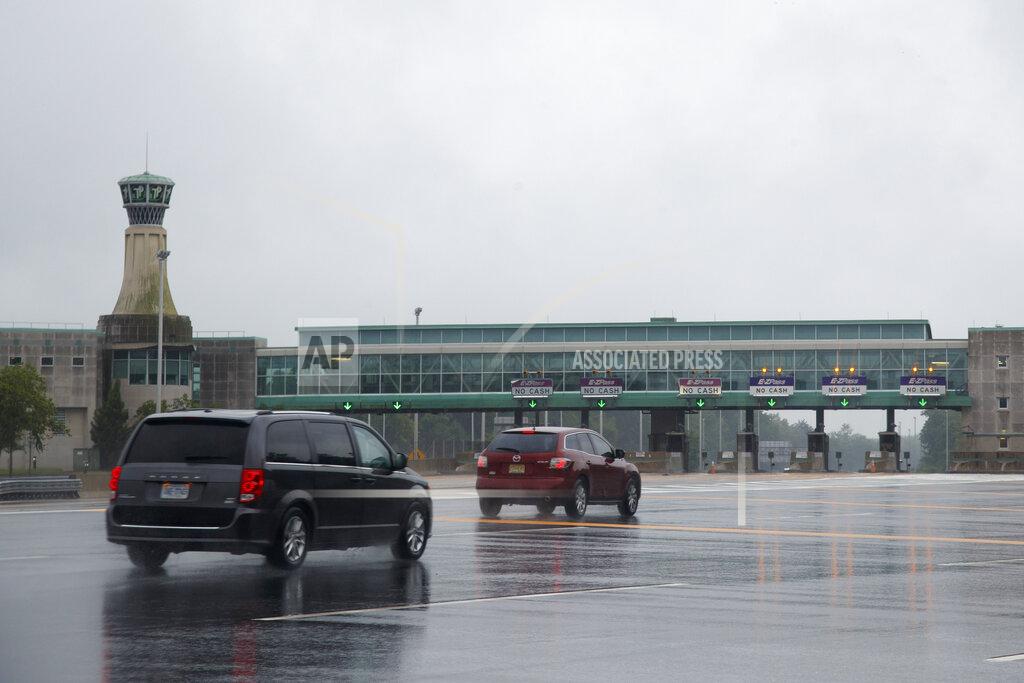 Matt Slocum Motorists pass through a New Jersey Turnpike toll plaza, Friday, July 31, 2020, in Carneys Point, N.J. (AP Photo/Matt Slocum)