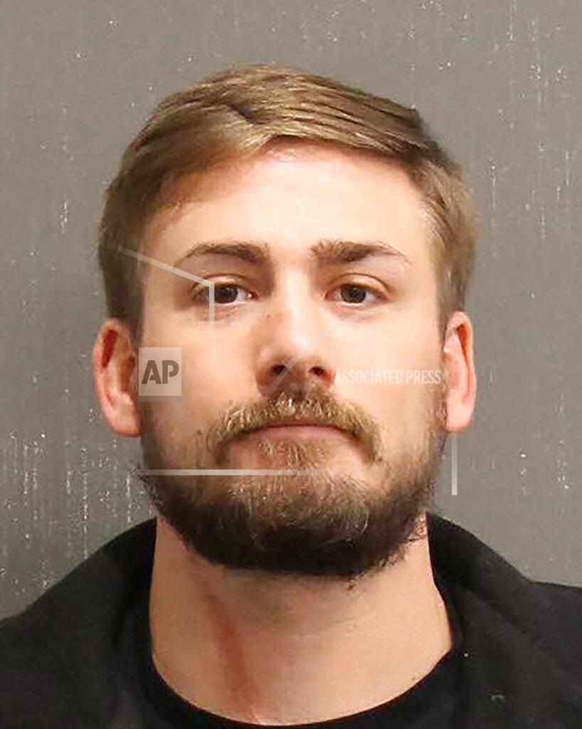 Uncredited This photo provided by Metro Government of Nashville and Davidson County, Tenn., shows Eric Gavelek Munchel. Munchel has been arrested in Tennessee in connection with the riot at the U.S. Capitol in Washington. (Metro Government of Nashville and Davidson County, Tenn. via AP)