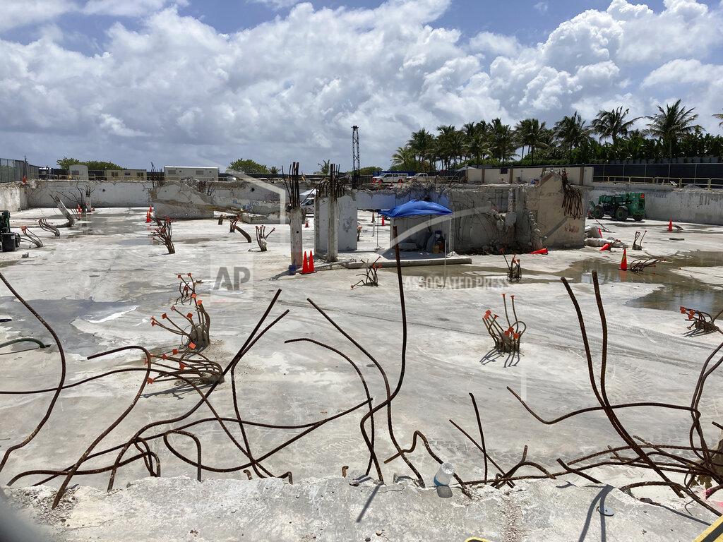 Wilfredo Lee FILE - The site where the Champlain Towers South collapsed killing 98 people is shown on April 14, 2022, in Surfside, Fla. A judge has given final approval Thursday, June 23, 2022, to a settlement of more than $1 billion for victims of the collapse of a Florida beachfront condominium. Ninety-eight people died when the 12-story Champlain Towers South suddenly collapsed. The decision comes one day before the one-year anniversary of the disaster in the Miami suburb of Surfside. (AP Photo/Wilfredo Lee, File)