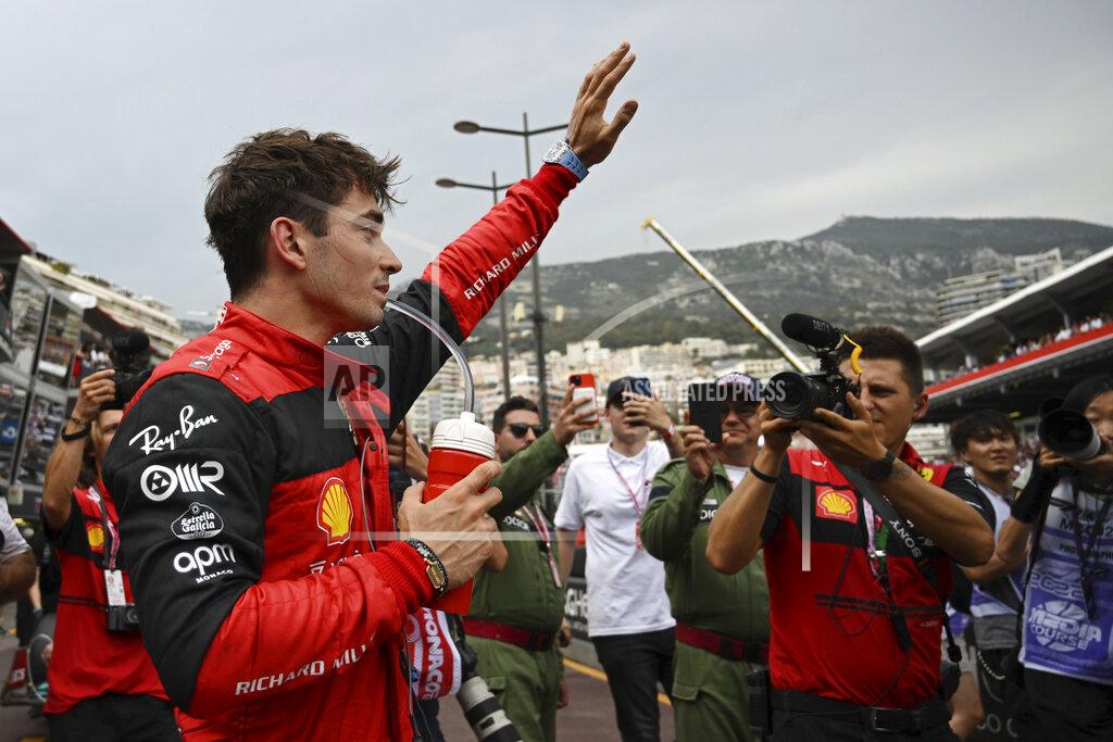 Christian Bruna Ferrari driver Charles Leclerc of Monaco celebrates after setting the pole position in the qualifying session at the Monaco racetrack, in Monaco, Saturday, May 28, 2022. The Formula one race will be held on Sunday. (Pool Photo/Christian Bruna/Via AP)