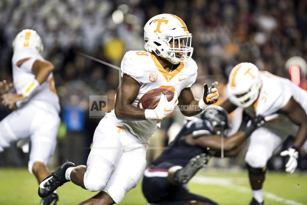 Sean Rayford Tennessee running back Ty Chandler (8) runs the ball against South Carolina during the first half of an NCAA college football game Saturday, Oct. 27, 2018, in Columbia, S.C. (AP Photo/Sean Rayford)