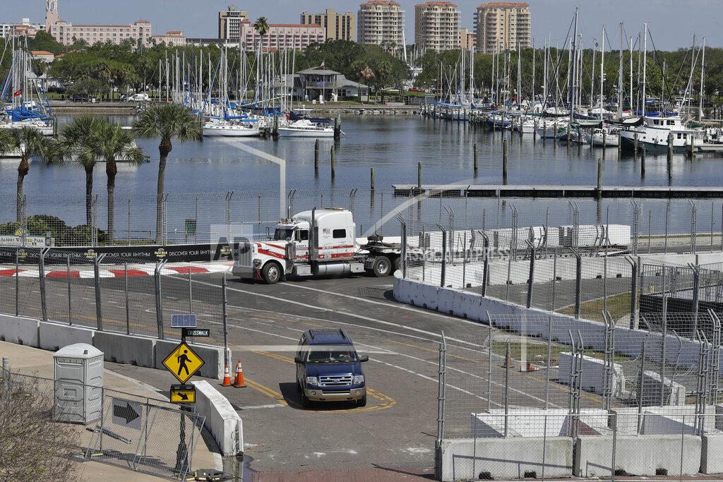 Chris O'meara Workers begin to dismantle the track for the IndyCar Firestone Grand Prix of St. Petersburg auto race Monday, March 16, 2020, in St. Petersburg, Fla. Race organizers canceled the event to help curb the spread of the coronavirus. (AP Photo/Chris O'Meara)