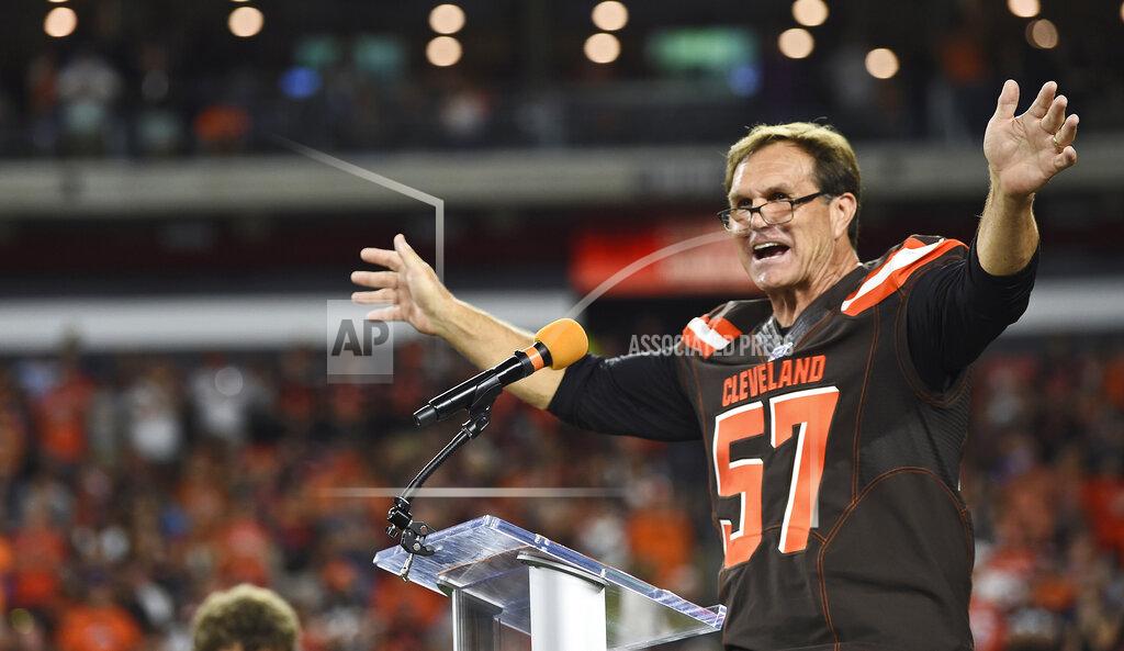 David Dermer FILE - Former Cleveland Browns' Clay Matthews speaks during halftime of an NFL football game between the Los Angeles Rams and the Cleveland Browns in Cleveland, where he was inducted into the Browns' Ring of Honor, in this Sunday, Sept. 22, 2019, file photo. Matthews is a 2021 finalist for entry into the Pro Football Hall of Fame (AP Photo/David Dermer, File)