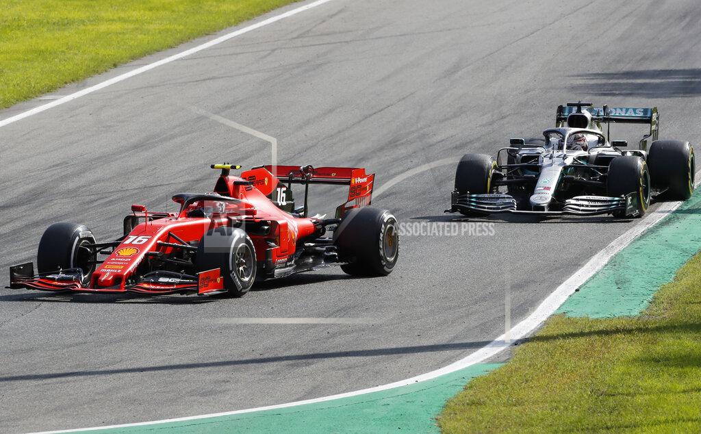 Antonio Calanni Ferrari driver Charles Leclerc of Monaco is chased by Mercedes driver Lewis Hamilton of Britain during the Formula One Italy Grand Prix at the Monza racetrack, in Monza, Italy, Sunday, Sept.8, 2019. (AP Photo/Antonio Calanni)