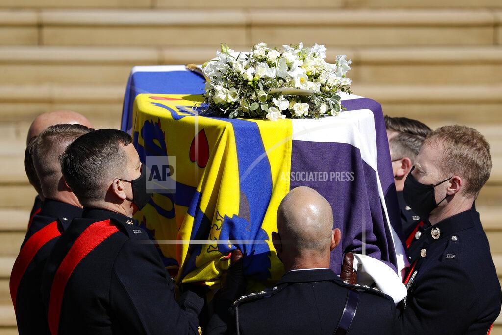 Kirsty Wigglesworth The coffin arrives at St George's Chapel for the funeral of Britain's Prince Philip inside Windsor Castle in Windsor, England, Saturday, April 17, 2021. (Kirsty Wigglesworth/Pool via AP)
