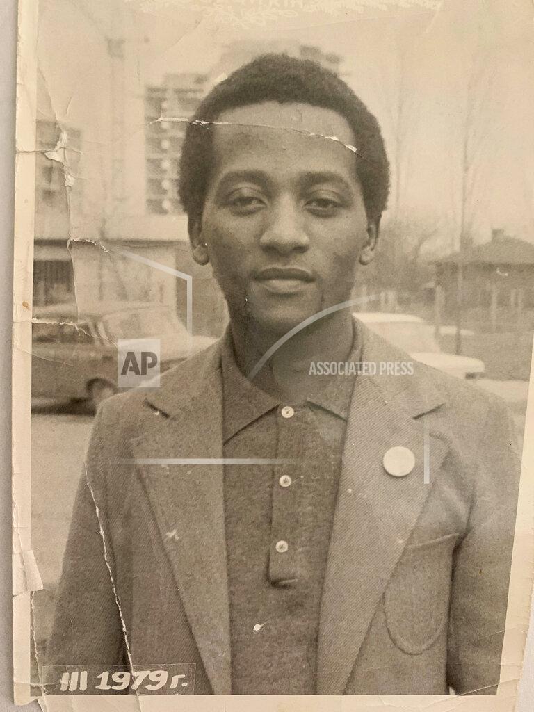 Uncredited FILE - In In this photo supplied courtesy of the Mini family the late South African doctor and activist Dr. Clarence Mini is photographed in this 1979 photo in Bulgaria. Clarence Mini, a South African activist and doctor who died of COVID-19 spent his life fighting apartheid, the government's denial of HIV/AIDS and rampant corruption. Loved ones say Mini knew the odds were against him but he was committed to what he believed was right. He died in May at age 69. (Photo courtesy of the Mini family via AP)