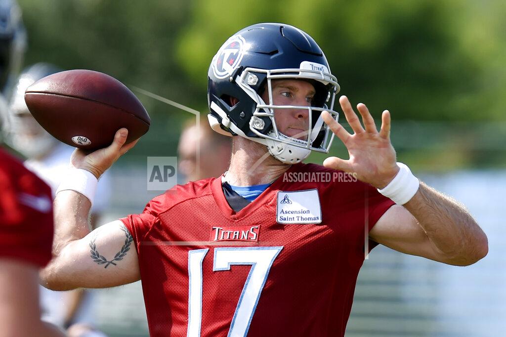Mark Zaleski FILE - Tennessee Titans quarterback Ryan Tannehill (17) throws a pass during NFL football training camp in Nashville, tenn., in this Wednesday, July 28, 2021, file photo. The league can’t mandate the vaccine but it made its stance clear through strict protocols for players who don’t get it. “I wouldn’t have got the vaccine without the protocols they are enforcing on us,” Tannehill said this week. (AP Photo/Mark Zaleski, File)