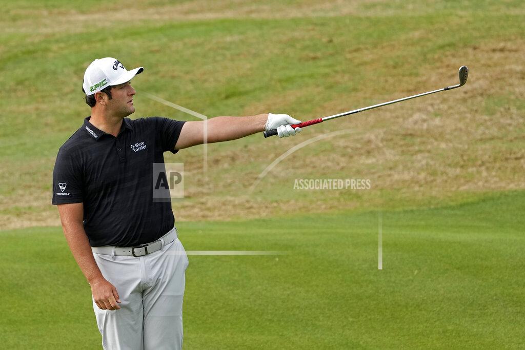 David J. Phillip Jon Rahm, of Spain, reacts to his fourth shot on the fifth hole, during a first round match at the Dell Technologies Match Play Championship golf tournament Wednesday, March 24, 2021, in Austin, Texas. (AP Photo/David J. Phillip)