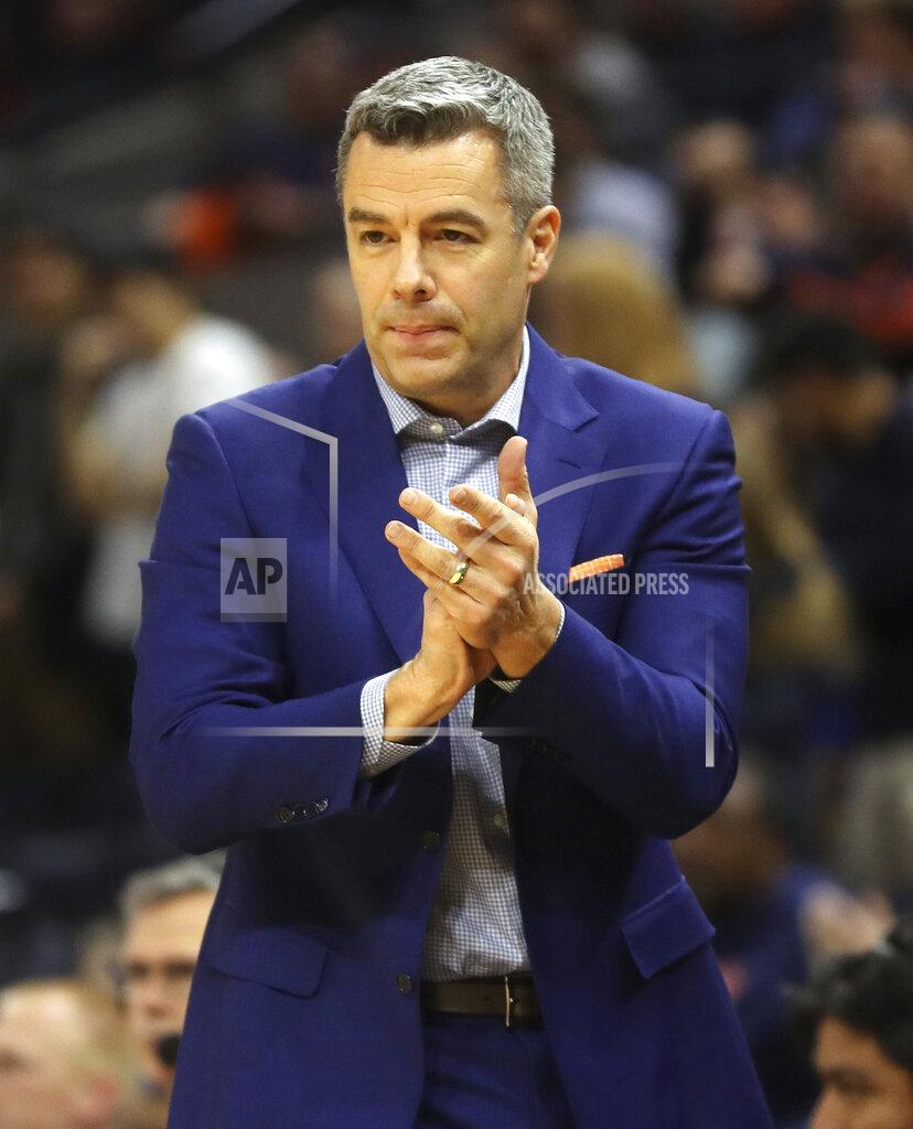 Andrew Shurtleff Virginia coach Tony Bennett reacts to a play during the team's NCAA college basketball game against Stony Brook in Charlottesville, Va., Wednesday, Dec. 18, 2019. (AP Photo/Andrew Shurtleff)