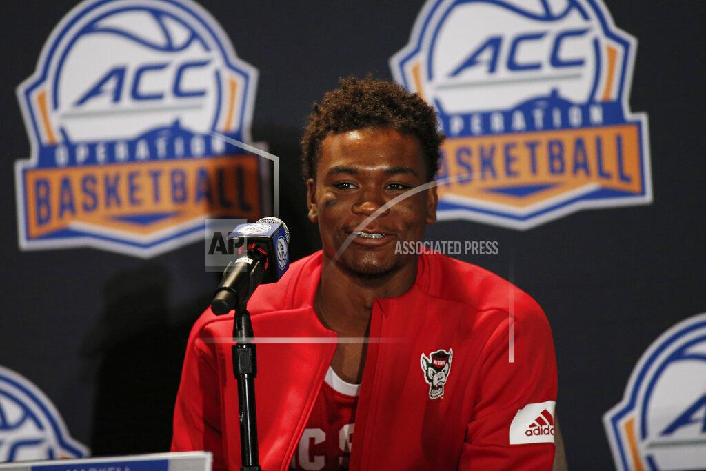 Nell Redmond North Carolina State basketball player Markell Johnson answers a question during the Atlantic Coast Conference NCAA college basketball media day in Charlotte, N.C., Tuesday, Oct. 8, 2019. (AP Photo/Nell Redmond)