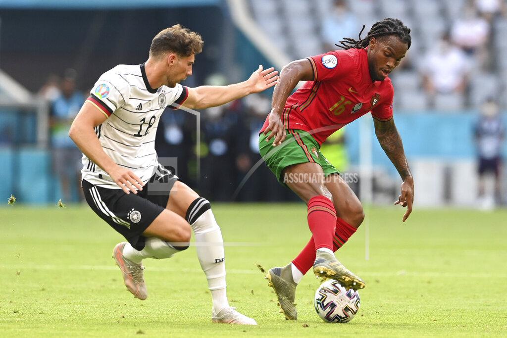Christof Stache Germany's Leon Goretzka, left, challenges Portugal's Renato Sanches during the Euro 2020 soccer championship group F match between Portugal and Germany at the football arena stadium in Munich, Saturday, June 19, 2021. (Christof Stache/Pool via AP)