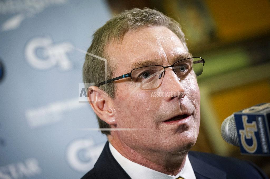 John Amis FILE - In this Sept. 22, 2016 file photo, Todd Stansbury speaks during a news conference where he was introduced as Georgia Tech's new athletic director, in Atlanta. Stansbury is among three athletic directors representing Power Five leagues who are new members of the College Football Playoff selection committee. Nearly half of the 13 committee members are serving for the first time. There are six new members taking part in the process to determine the first ranking for this season. It is the biggest turnover since the original group in 2013. The first 2018 ranking comes out Tuesday night, Oct. 30, 2018. It will be the first of six rankings this season to determine who plays in the national semifinal games. AP Photo/John Amis, File)