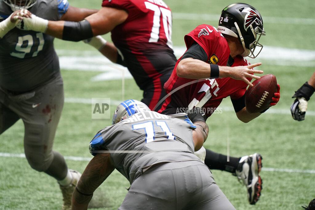Brynn Anderson Atlanta Falcons quarterback Matt Ryan (2) moves away from Detroit Lions nose tackle Danny Shelton (71) during the first half of an NFL football game, Sunday, Oct. 25, 2020, in Atlanta. (AP Photo/Brynn Anderson)