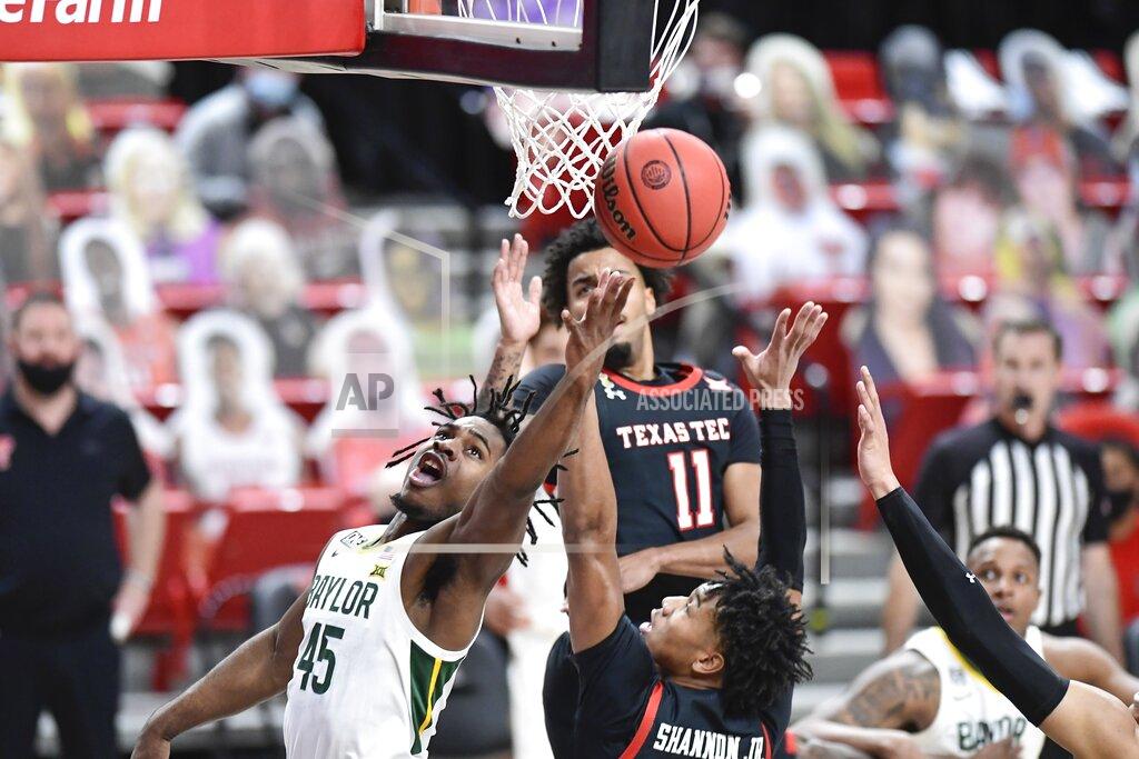 Justin Rex Baylor's Davion Mitchell (45) shoots the ball during the first half of an NCAA college basketball game against Texas Tech in Lubbock, Texas, Saturday, Jan. 16, 2021. (AP Photo/Justin Rex)
