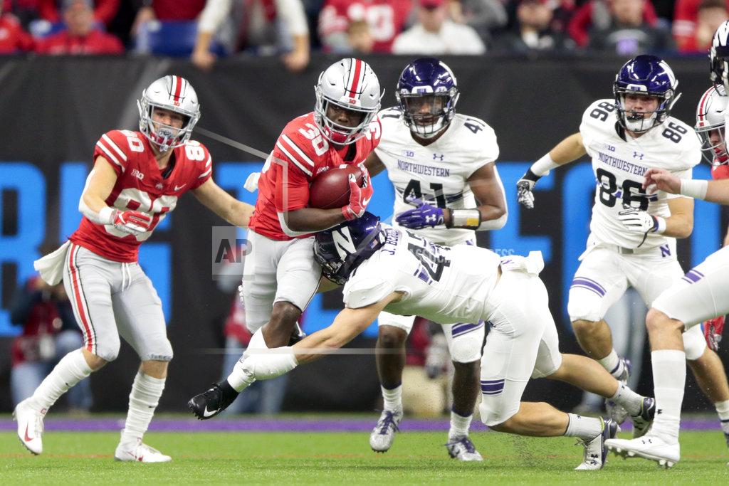 Aj Mast Ohio State running back Demario McCall (30) is tackled by Northwestern defensive back Joe Bergin during the second half of the Big Ten championship NCAA college football game, Saturday, Dec. 1, 2018, in Indianapolis. (AP Photo/AJ Mast)