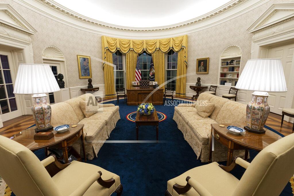 The Oval Office of the White House is newly redecorated for the first day of President Joe Biden's administration, Wednesday, Jan. 20, 2021, in Washington. (AP Photo/Alex Brandon)