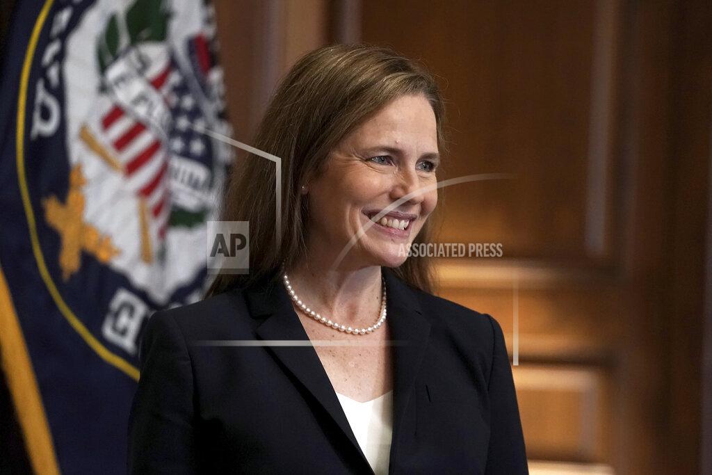 Greg Nash Supreme Court nominee Amy Coney Barrett, meets with Sen. Martha McSally, R-Ariz., Wednesday, Oct. 21, 2020, on Capitol Hill in Washington. (Greg Nash/Pool via AP)