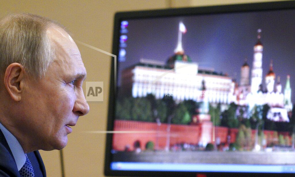 Russian President Vladimir Putin chairs a meeting with members of the Council for Interethnic Relations via video conference at the Novo-Ogaryovo residence outside Moscow, Russia, Tuesday, March 30, 2021. (Alexei Druzhinin, Sputnik, Kremlin Pool Photo via AP)