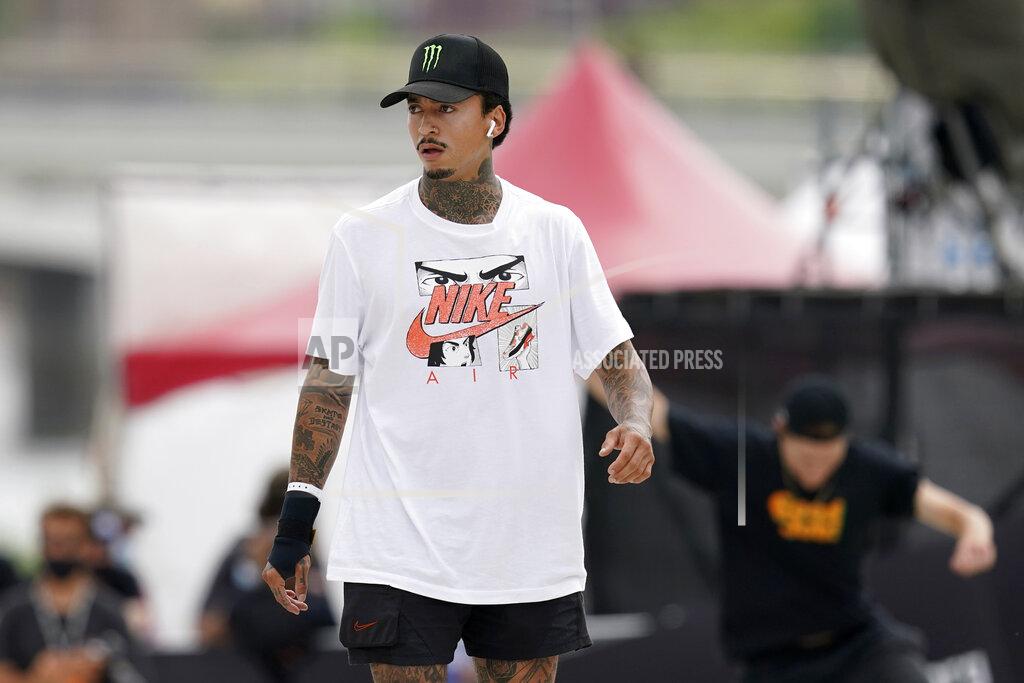 Charlie Neibergall Nyjah Huston, of the United States, practices during an Olympic qualifying skateboard event at Lauridsen Skatepark, Saturday, May 22, 2021, in Des Moines, Iowa. The questions under the magnifying glass at this week's Dew Tour — one of the last major qualifying events for the games in Tokyo in July — is whether the Olympics is ready for skateboarding and, more tellingly, whether skateboarding is ready for the Olympics. (AP Photo/Charlie Neibergall)