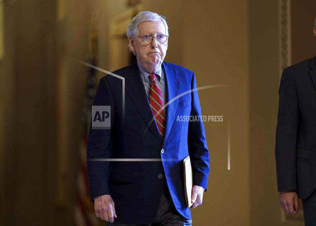 J. Scott Applewhite Senate Minority Leader Mitch McConnell, R-Ky., walks to the chamber as the Senate works to advance the $1 trillion bipartisan infrastructure bill, at the Capitol in Washington, Monday, Aug. 2, 2021. The 2,700-page bill includes new expenditures on roads, bridges, water pipes broadband and other projects, plus cyber security. (AP Photo/J. Scott Applewhite)