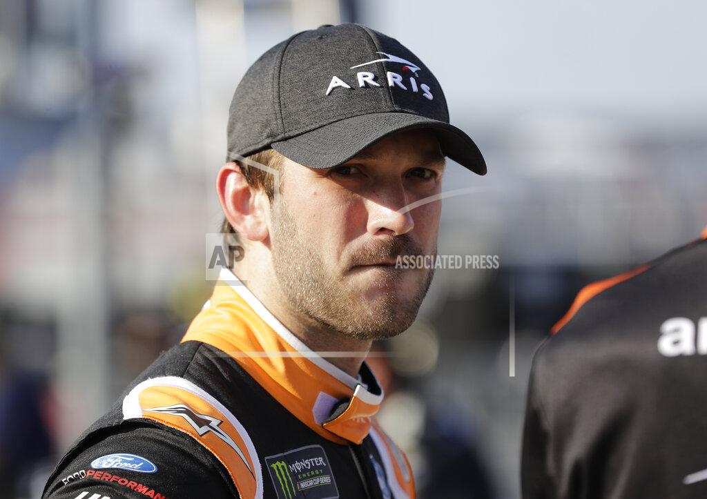 Chuck Burton Daniel Suarez looks down pit road before qualifying for Saturday's NASCAR All-Star Cup series auto race at Charlotte Motor Speedway in Concord, N.C., Friday, May 17, 2019. (AP Photo/Chuck Burton)