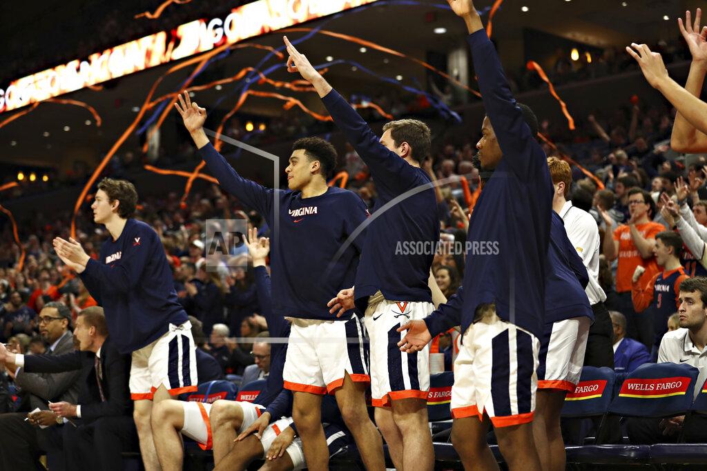 Erin Edgerton Virginia players celebrate a score during an NCAA college basketball game against Clemson on Wednesday, Feb. 5, 2020, in Charlottesville, Va. (Erin Edgerton/The Daily Progress via AP)