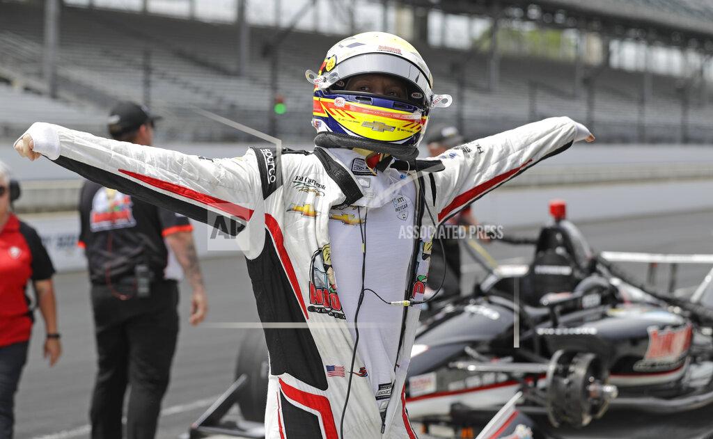 Darron Cummings Spencer Pigot prepares to get into his car during practice for the Indianapolis 500 IndyCar auto race at Indianapolis Motor Speedway, Thursday, May 16, 2019 in Indianapolis. (AP Photo/Darron Cummings)
