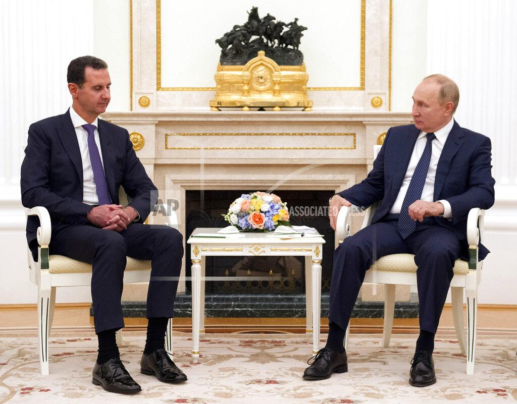 Mikhail Klimentyev Russian President Vladimir Putin, right, listens to Syrian President Bashar Assad during their meeting in the Kremlin in Moscow, Russia, Monday, Sept. 13, 2021. (Mikhail Klimentyev, Sputnik, Kremlin Pool Photo via AP)