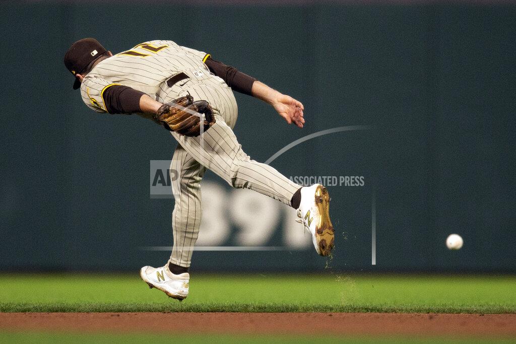 D. Ross Cameron San Diego Padres second baseman Adam Frazier can't get to an RBI single by San Francisco Giants' Tommy LaStella during the fourth inning of a baseball game, Tuesday, Sept. 14, 2021, in San Francisco. (AP Photo/D. Ross Cameron)