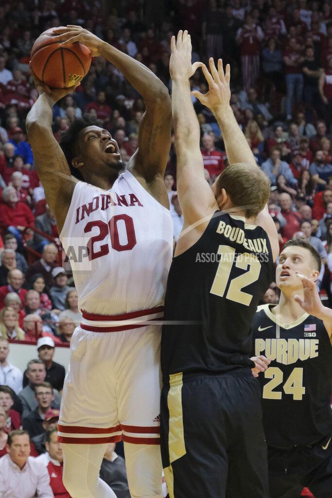 Aj Mast Indiana forward De'Ron Davis (20) shoots over Purdue forward Evan Boudreaux (12) during the second half of an NCAA college basketball game in Bloomington, Ind., Tuesday, Feb. 19, 2019. Purdue won 48-46. (AP Photo/AJ Mast)