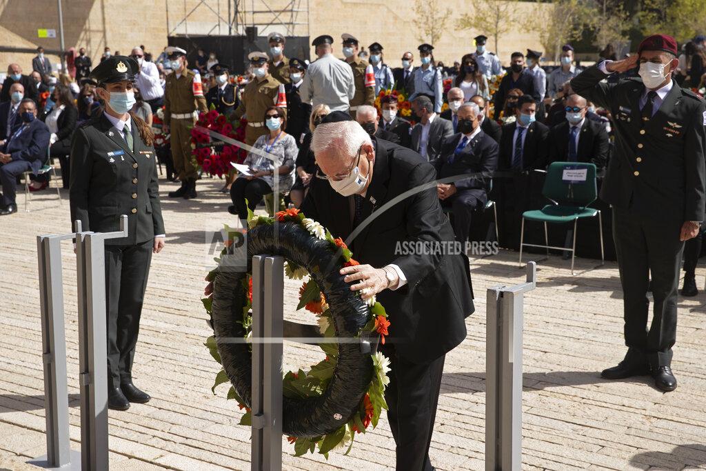 Maya Alleruzzo Israeli President Reuvin Rivlin lays a wreath at a ceremony marking the annual Holocaust Remembrance Day, at Yad Vashem Holocaust Memorial in Jerusalem, Thursday, April 8, 2021. (AP Photo/Maya Alleruzzo, Pool)