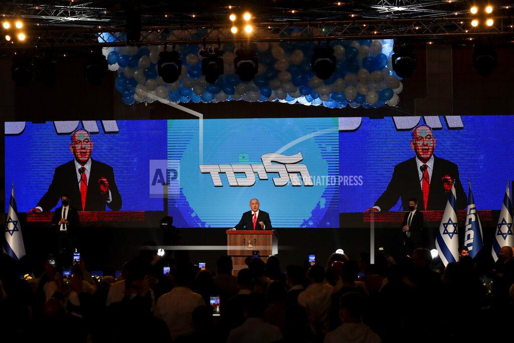Maya Alleruzzo Israeli Prime Minister Benjamin Netanyahu delivers a speech following the announcement of the first exit poll results for the Israeli parliamentary elections, at his Likud party headquarters in Jerusalem, Wednesday, March. 24, 2021. (AP Photo/Maya Alleruzzo)