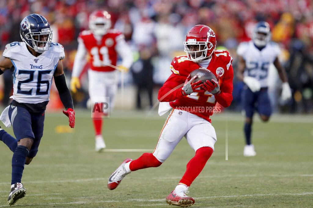 Charlie Neibergall Kansas City Chiefs' Sammy Watkins (14) catches a touchdown pass against Tennessee Titans cornerback Logan Ryan (26) during the second half of the NFL AFC Championship football game Sunday, Jan. 19, 2020, in Kansas City, MO. (AP Photo/Charlie Neibergall)