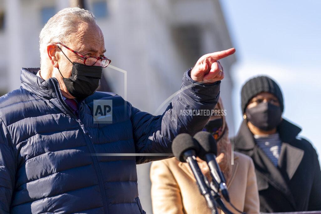 Andrew Harnik Senate Majority Leader Sen. Chuck Schumer of N.Y., takes a question during a news conference on Capitol Hill in Washington, Thursday, Feb. 4, 2021, about plans to reintroduce a resolution to call on President Biden to take executive action to cancel up to $50,000 in debt for federal student loan borrowers. (AP Photo/Andrew Harnik)