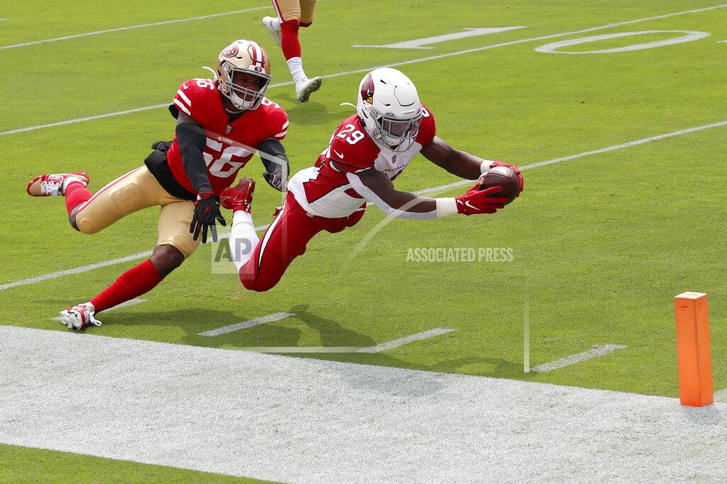 Josie Lepe Arizona Cardinals running back Chase Edmonds (29) dives past San Francisco 49ers middle linebacker Kwon Alexander (56) to score a touchdown during the first half of an NFL football game in Santa Clara, Calif., Sunday, Sept. 13, 2020. (AP Photo/Josie Lepe)