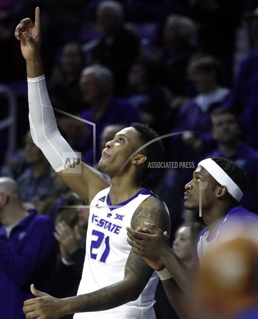 Orlin Wagner Kansas State forwards James Love III (21) and Austin Trice, right, celebrate a basket during the second half of the team's NCAA college basketball game against West Virginia in Manhattan, Kan., Wednesday, Jan. 9, 2019. (AP Photo/Orlin Wagner)