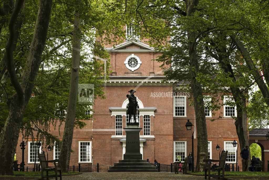 Matt Rourke FILE - The exterior of Independence Hall appears in Philadelphia, on April 26, 2019. The location is featured in a collection of mini-essays by American writers published online by the Frommer's guidebook company about places they believe helped shape and define America. (AP Photo/Matt Rourke, File)