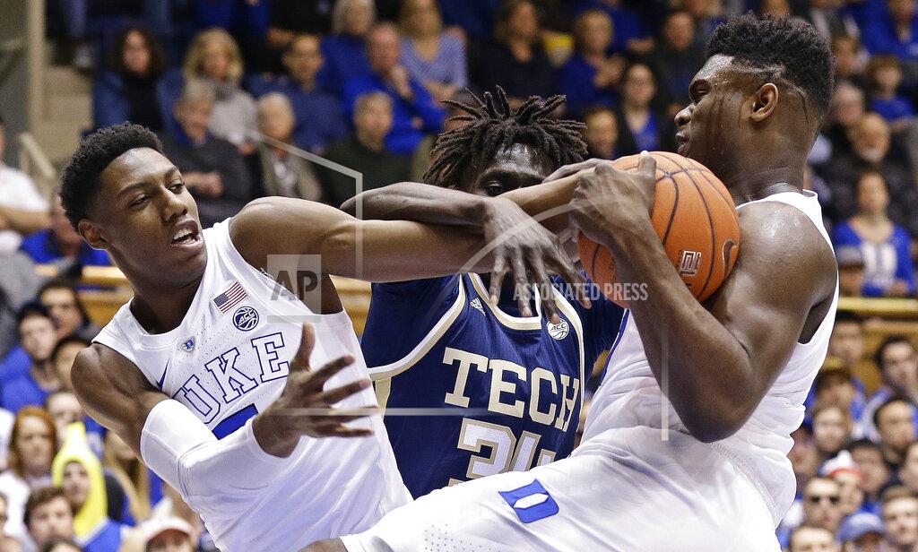 Gerry Broome Duke's RJ Barrett, left, and Zion Williamson struggle with Georgia Tech's Abdoulaye Gueye (34) for a rebound during the first half of an NCAA college basketball game in Durham, N.C., Saturday, Jan. 26, 2019. (AP Photo/Gerry Broome)