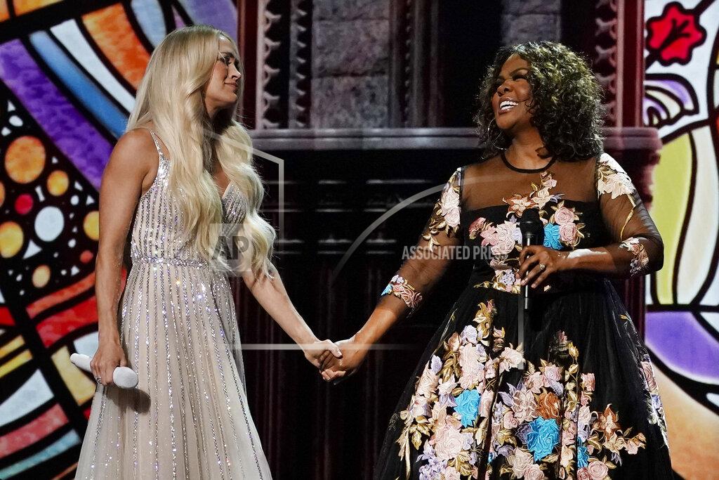 Mark Humphrey Carrie Underwood, left, and CeCe Winans perform at the 56th annual Academy of Country Music Awards on Saturday, April 17, 2021, at the Grand Ole Opry in Nashville, Tenn. The awards show airs on April 18 with both live and prerecorded segments. (AP Photo/Mark Humphrey)