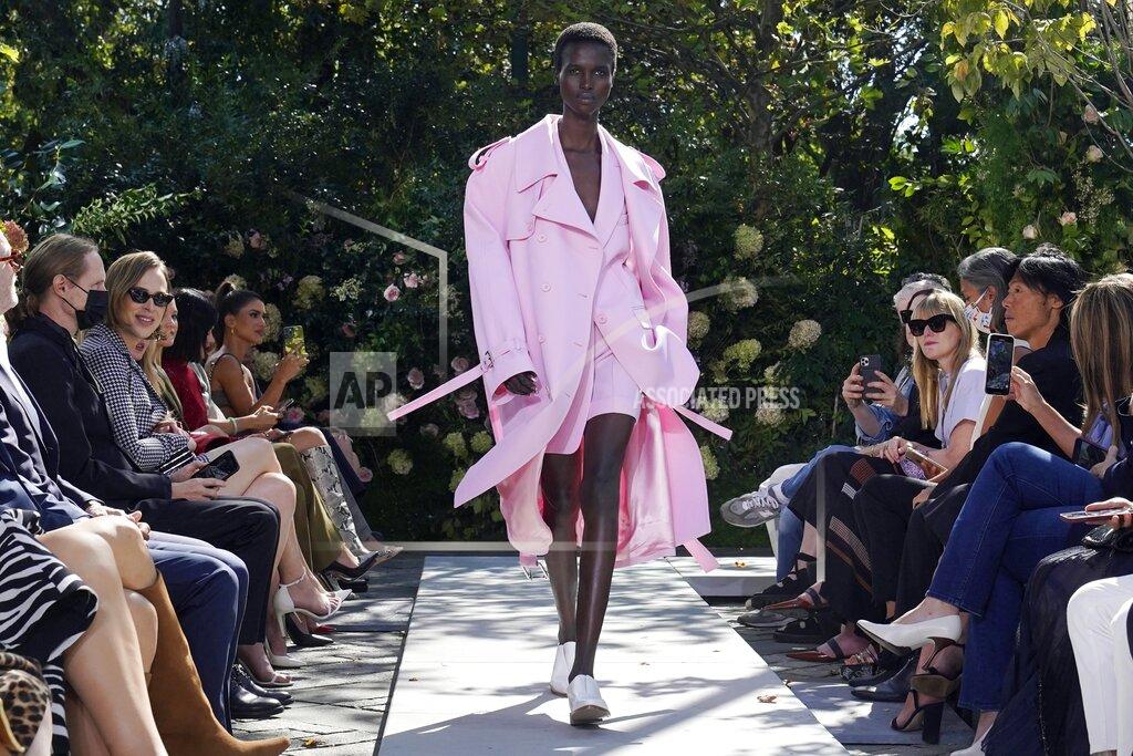 Richard Drew The Michael Kors Spring/Summer 2022 collection is modeled during Fashion Week, in New York, Friday, Sept. 10, 2021. (AP Photo/Richard Drew)