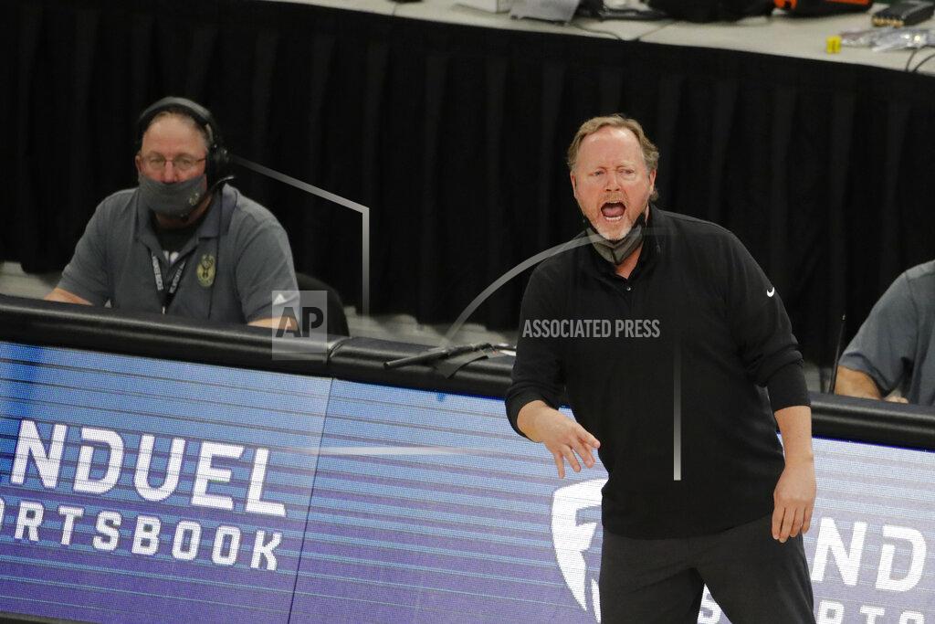 Aaron Gash Milwaukee Bucks head coach Mike Budenholzer shouts from the sideline during the first half of an NBA basketball game against the Brooklyn Nets Tuesday, May 4, 2021, in Milwaukee. (AP Photo/Aaron Gash)
