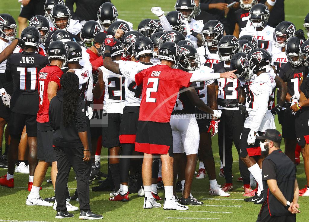 Curtis Compton The Atlanta Falcons, led by quarterback Matt Ryan (2), take the field to begin NFL football training camp practice Saturday, Aug. 15, 2020, in Flowery Branch, Ga. (Curtis Compton/Atlanta Journal-Constitution via AP)