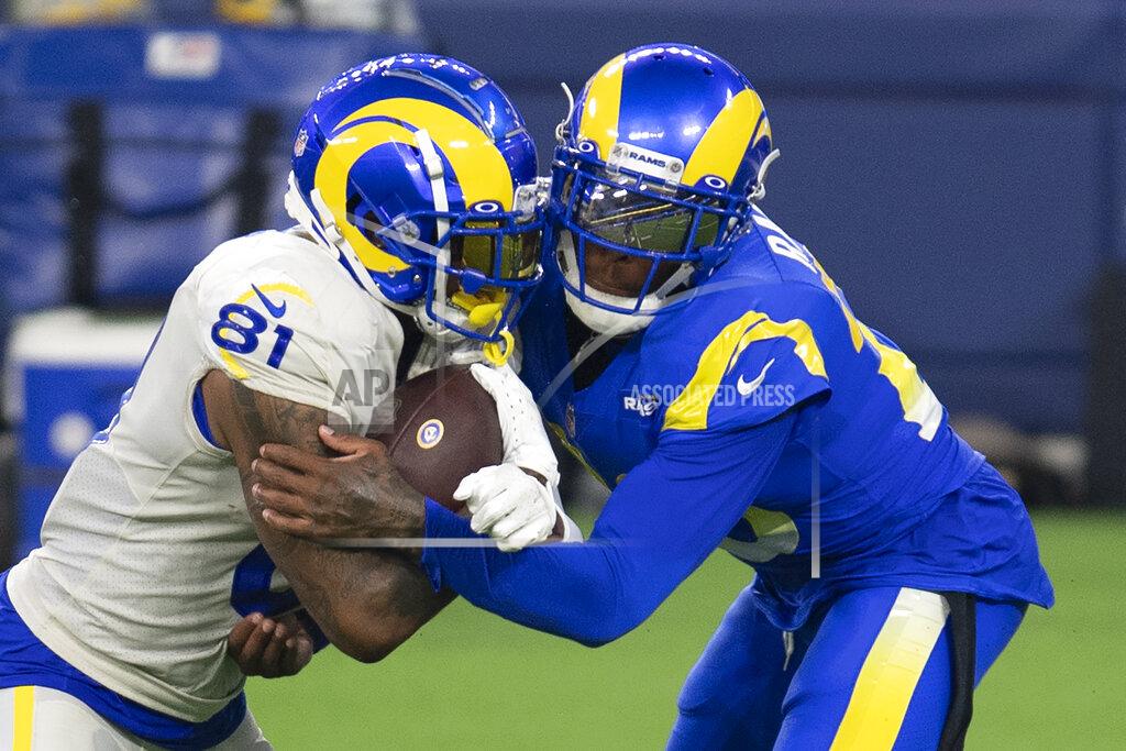Kyusung Gong Los Angeles Rams cornerback Jalen Ramsey, right, tackles tight end Gerald Everett during NFL football practice Saturday, Aug. 22, 2020, in Inglewood, Calif. The Rams held their first practice at their new stadium. (AP Photo/Kyusung Gong)