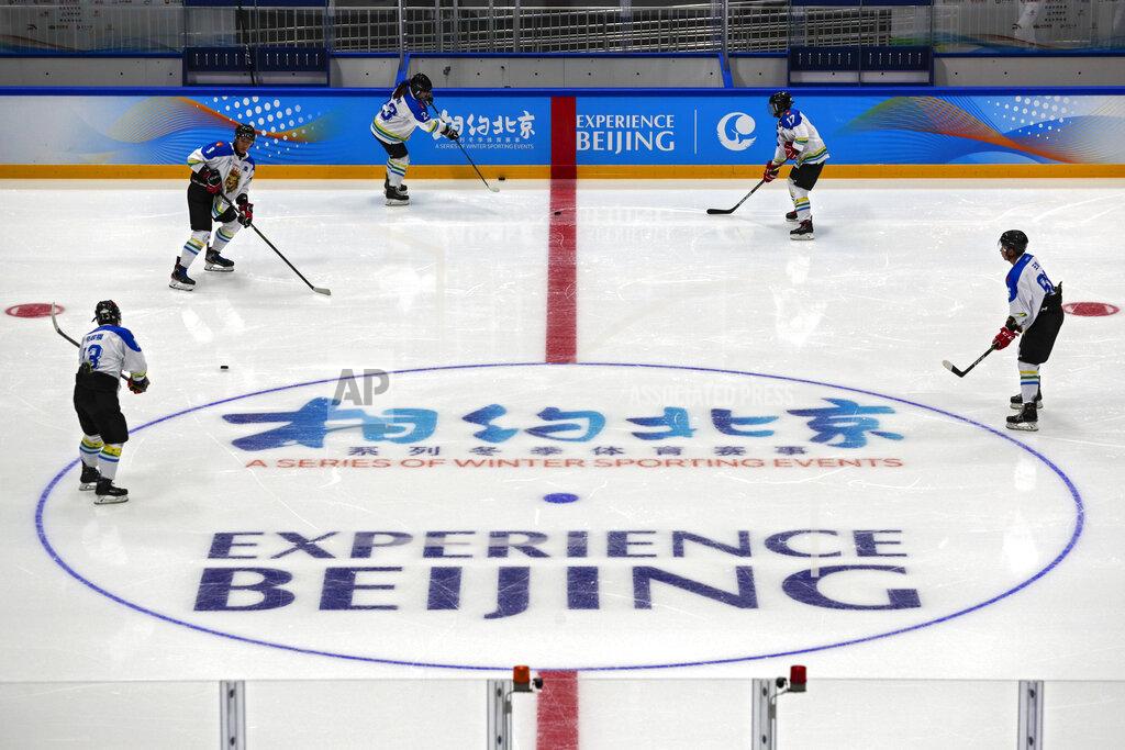 Andy Wong Capital Institute hockey team players practice at the ice hockey venue for the 2022 Beijing Winter Olympics during a test event at the National Indoor Stadium in Beijing, Thursday, April 1, 2021. Chinese capital holds 10 days test events for 2022 Beijing Winter Olympics in five different venues from April 1-10 and becomes the first city to hold both the Winter and Summer Olympics. (AP Photo/Andy Wong)