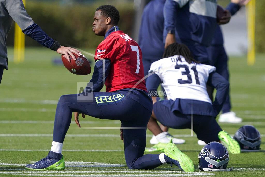 Ted S. Warren Seattle Seahawks backup quarterback Geno Smith (7) stretches before NFL football practice, Wednesday, Oct. 13, 2021, in Renton, Wash. Starting quarterback Russell Wilson had surgery on his hand last Friday, and Smith is expected to be the starting quarterback Sunday when the Seahawks play the Pittsburgh Steelers on the road. (AP Photo/Ted S. Warren)