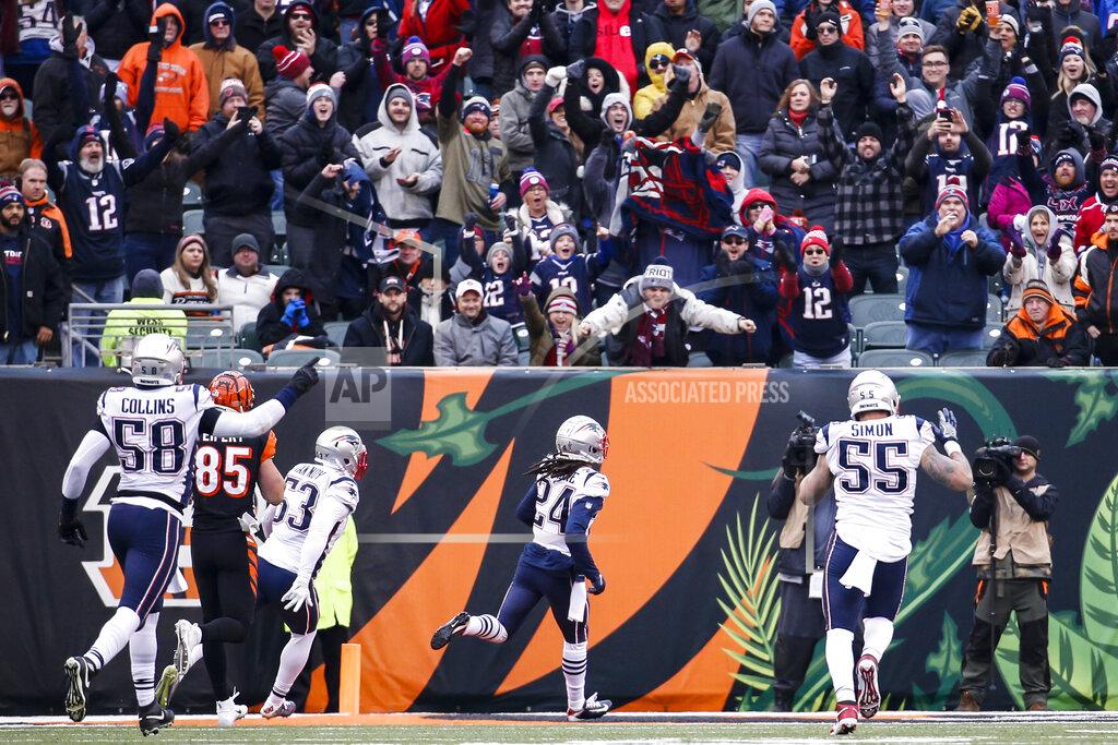 Frank Victores New England Patriots cornerback Stephon Gilmore (24) runs in a touchdown off an interception in the second half of an NFL football game against the Cincinnati Bengals, Sunday, Dec. 15, 2019, in Cincinnati. (AP Photo/Frank Victores)