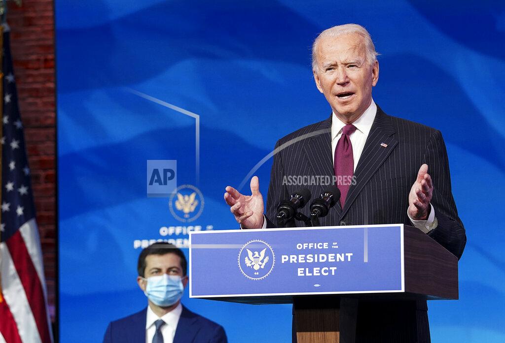 Kevin Lamarque President-elect Joe Biden speaks as he announces former South Bend, Ind. Mayor Pete Buttigieg as his nominee for transportation secretary during a news conference at The Queen theater in Wilmington, Del., Wednesday, Dec. 16, 2020. (Kevin Lamarque/Pool via AP)