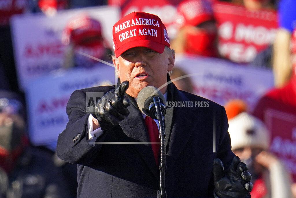 President Donald Trump gestures while addressing a campaign rally at the Wilkes-Barre Scranton International Airport in Avoca, Pa, Monday, Nov. 2, 2020. (AP Photo/Gene J. Puskar)